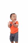 Happy One Year Old Baby Boy Walking On White Background Stock Photo