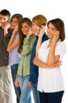 Teenagers Talking Over Phone Stock Photo