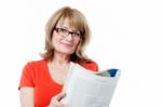 Mature Woman Reading Book Stock Photo