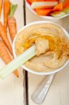 Fresh Hummus Dip With Raw Carrot And Celery Stock Photo