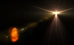 Abstract Digital Lens Flare In Black Background Horizontal Frame Stock Photo