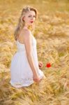 Portrait Of Beautiful Girl In Field Stock Photo