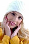 Smiling Woman Wearing Woolen Cap Stock Photo