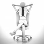 Businessman Doll Sitting On Chair Stock Photo