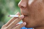 Man Smoking Tobacco Stock Photo