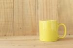 Yellow Ceramic Coffee Mug Stock Photo