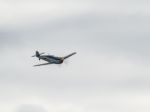 Messerchmitt Bf-109g (hispano Ha-1112 Mil Buchon) Flying Over Bi Stock Photo