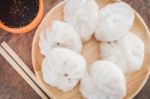 Chinese Leek Steamed Dessert On Wooden Table Stock Photo