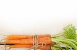 Baby Carrots Bunch Tied With Rope Stock Photo