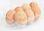 Smiley And Angry Egg Stock Photo