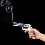 Hand With Pistol Stock Photo