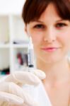 Woman Doctor With Syringe Stock Photo