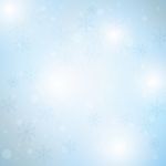 Winter Blue Sky With Falling Snow Stock Photo