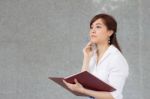 Portrait Of Thai Adult Businesswoman Beautiful Girl Read A Book Stock Photo