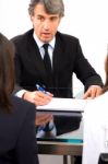 Business Man At Meeting Stock Photo