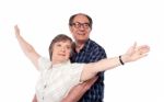 Senior Couple Hugging On White Stock Photo