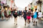 Blurred People Walking On The Street Stock Photo