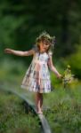 Little Girl Playing On The Railroad Stock Photo