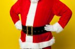 Cropped Image Of Santa Resting His Hands On Waist Stock Photo