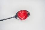 Red Heart Candy On Spoon For Valentine's Day Stock Photo