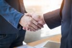 Two Confident Business Man Shaking Hands During A Meeting In The Stock Photo