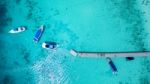 Top View Of Tourist Speed Boat Approaching To Floating Port In Phuket Island Andaman Sea Thailand Stock Photo