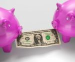 Piggybanks Eating Money Showing Monetary Loses Stock Photo