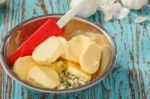 Cooking Herb Butter Rosemary Thyme On Rustic Wooden Background Closeup Stock Photo