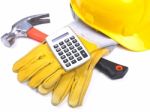 Hat Hammer Calculator and Gloves Stock Photo