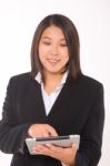 Asian Businesswoman With Tablet Stock Photo