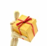 Dummy Holding Gift Box Stock Photo