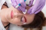 A Woman Getting Permanent Make Up Stock Photo