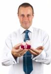 Businessman Holding Gift Box Stock Photo