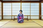 Asian Woman Wearing Japanese Traditional Kimono In Japan Stock Photo