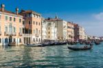 Gondoliers Ferrying People In Venice Stock Photo