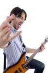 Young Rock Star Posing With Guitar Stock Photo