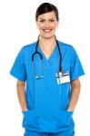 Female Doctor With Stethoscope Around Her Neck Stock Photo