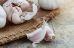 Garlic Cloves On Table Stock Photo