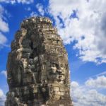 Ancient Stone Faces Of King Jayavarman Vii At The Bayon Temple, Stock Photo