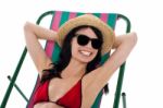 Smiling Gorgeous Bikini Model In Dark Shades Stock Photo