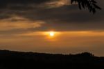 Blazing Sunset Over Mountain Stock Photo