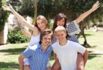 Happy Young Couples Enjoying Stock Photo