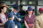 Friends Chatting At Horsted Keynes Station Stock Photo