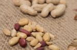 Peanuts On A Burlap Background Stock Photo