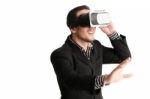 Isolated Young Businessman With Virtual Reality Glasses Stock Photo