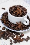 Cup Full Of Coffee Beans Stock Photo