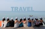 Women Friends Sit Hug Together Look Travel Blue Sea Sky Stock Photo