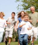 Happy Family In Playful Mood Stock Photo