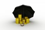 Gold Coins Under A Black Umbrella Stock Photo