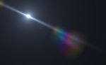 Abstract Lens Flare Lights And Black Background Stock Photo